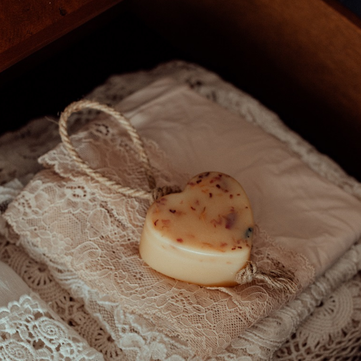 tangerine + lemon wax heart on a rope